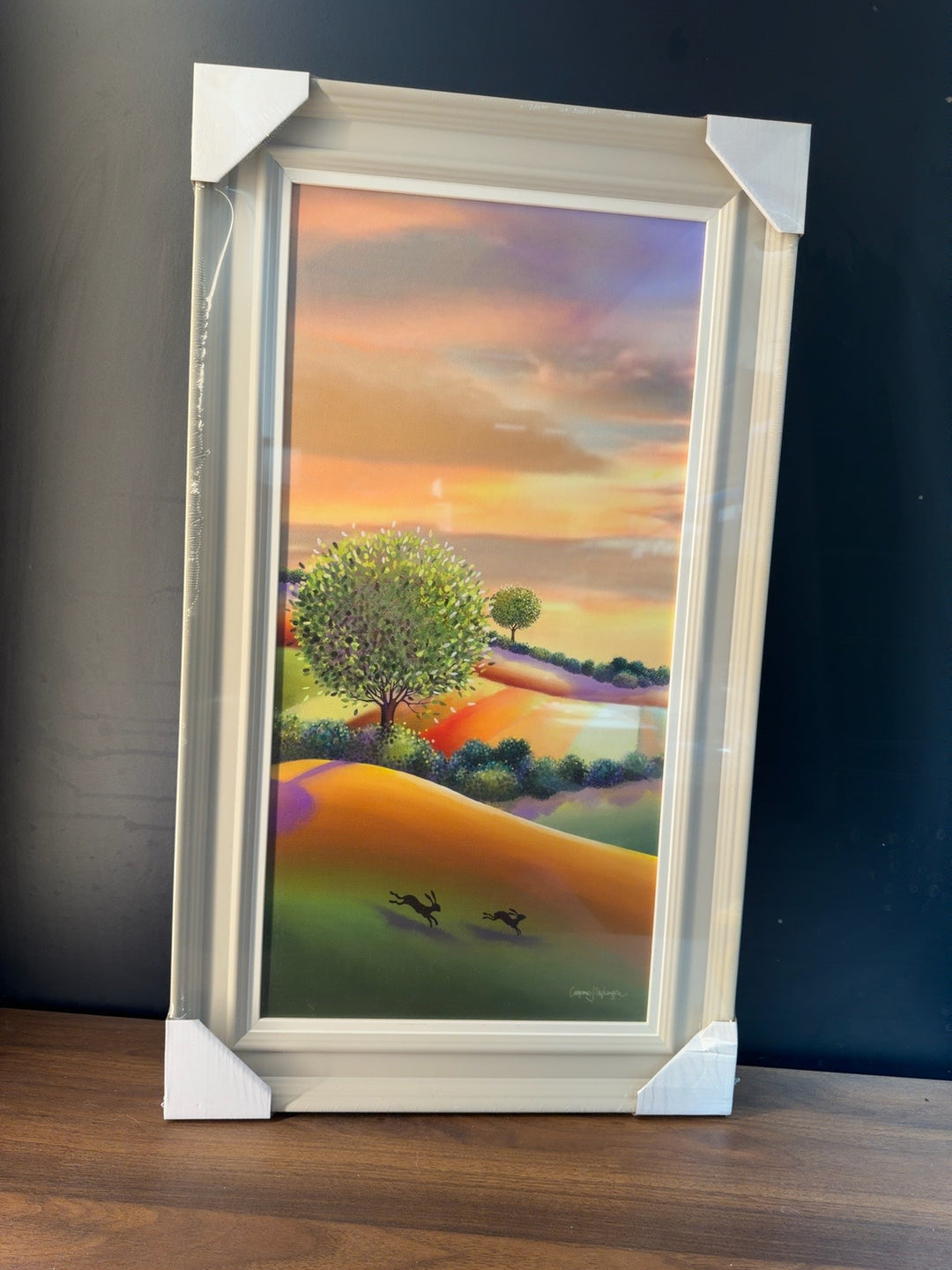 Catherine Stevenson colourful sunset landscape with running hares trial piece 42cm by 71cm