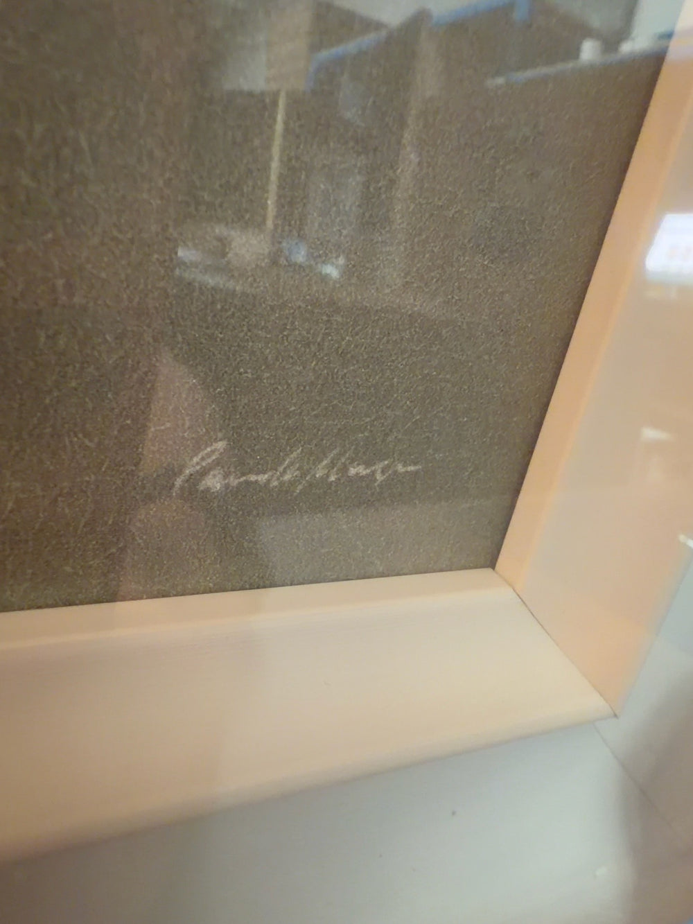 Close-up of artist signature on contemporary rabbit trial piece