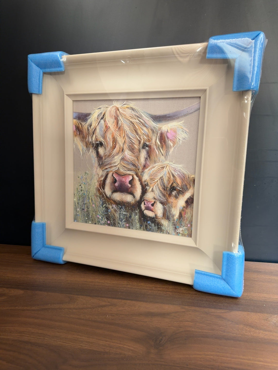 Highland Cow and Calf trial artwork by Louise Luton in a cream frame