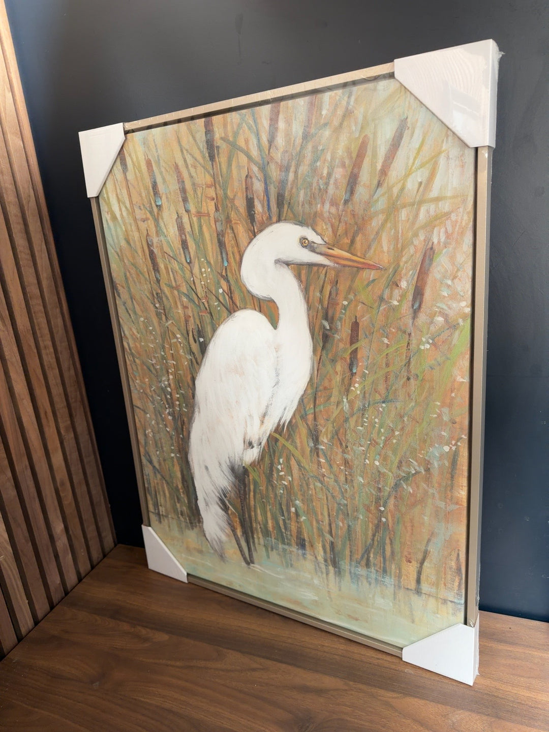 White Heron trial artwork by T. J. Cardolia in a slim neutral frame